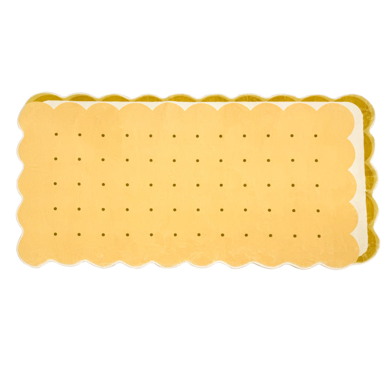 Kids area rug shaped like a biscuit with scalloped edges and dotted details, perfect for playful and cozy spaces.