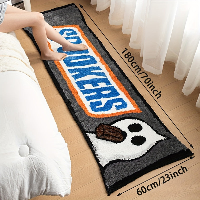 Long rectangular rug with playful ghost and bold text design, placed beside a bed with visible measurements.