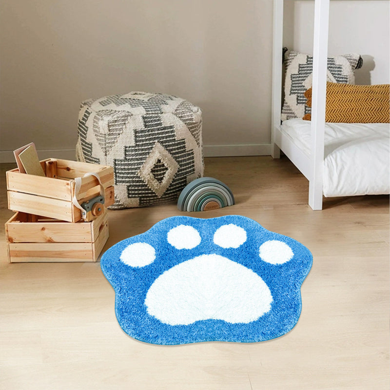 Blue and white paw print bathroom rug made of soft, absorbent microfiber with a non-slip backing.
