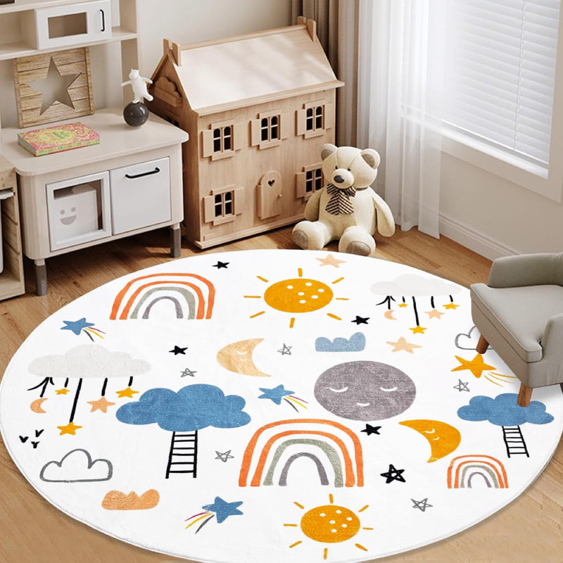 A round kids rug featuring colorful rainbows, smiling suns and moons, clouds, stars, and ladders on a white background. The playful design is ideal for a nursery or playroom.