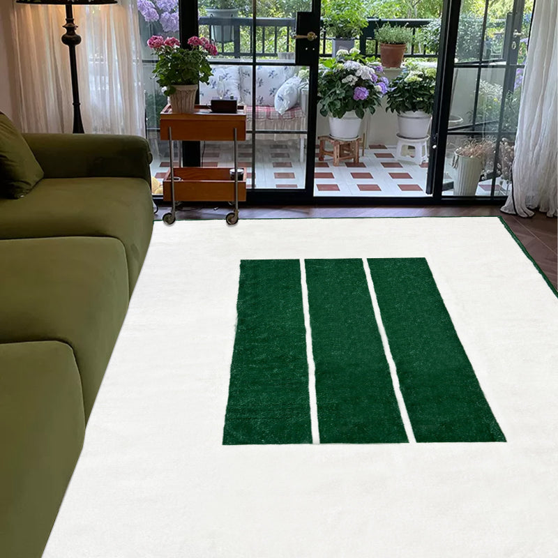 Minimalist white summer rug with three bold green horizontal stripes in the center.