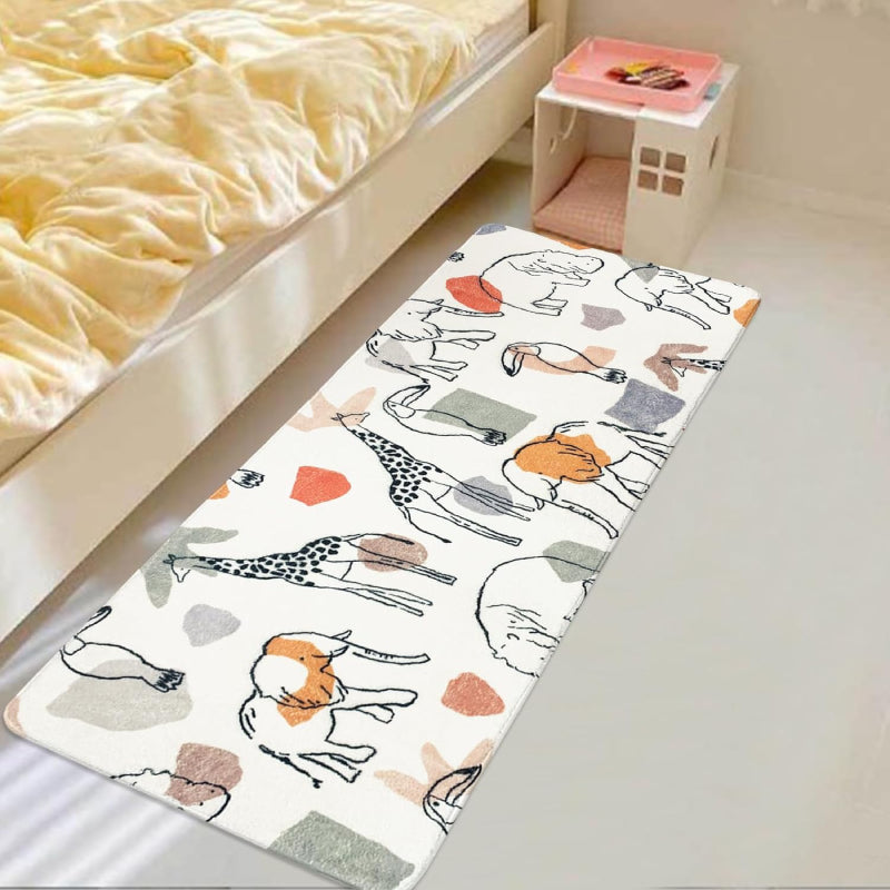 Children's bedroom with a soft rectangular rug featuring hand-drawn animals like giraffes, lions, elephants, and camels in neutral and pastel colors.