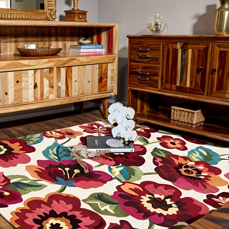 Colorful floral-patterned living room rug with vibrant red, pink, and orange flowers on a white background.