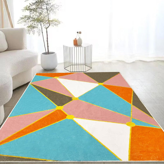 Colorful living room rug with a bright geometric pattern of intersecting triangles in blue, pink, orange, white, and brown, outlined with yellow lines and yellow circular nodes.