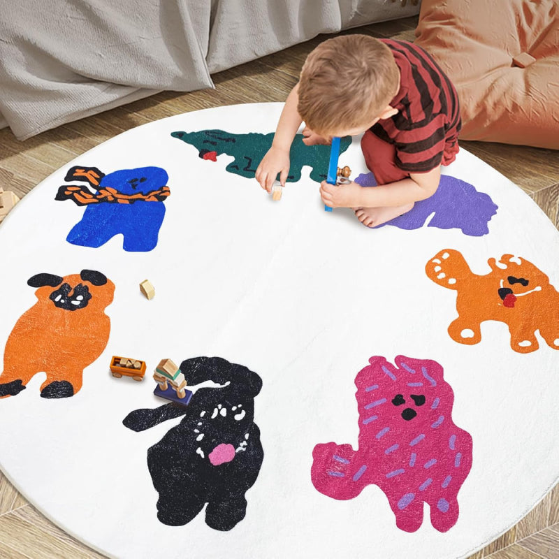 Round kids rug featuring colorful cartoon animals arranged in a circle on a white background, including playful characters in orange, black, green, purple, pink, and blue.