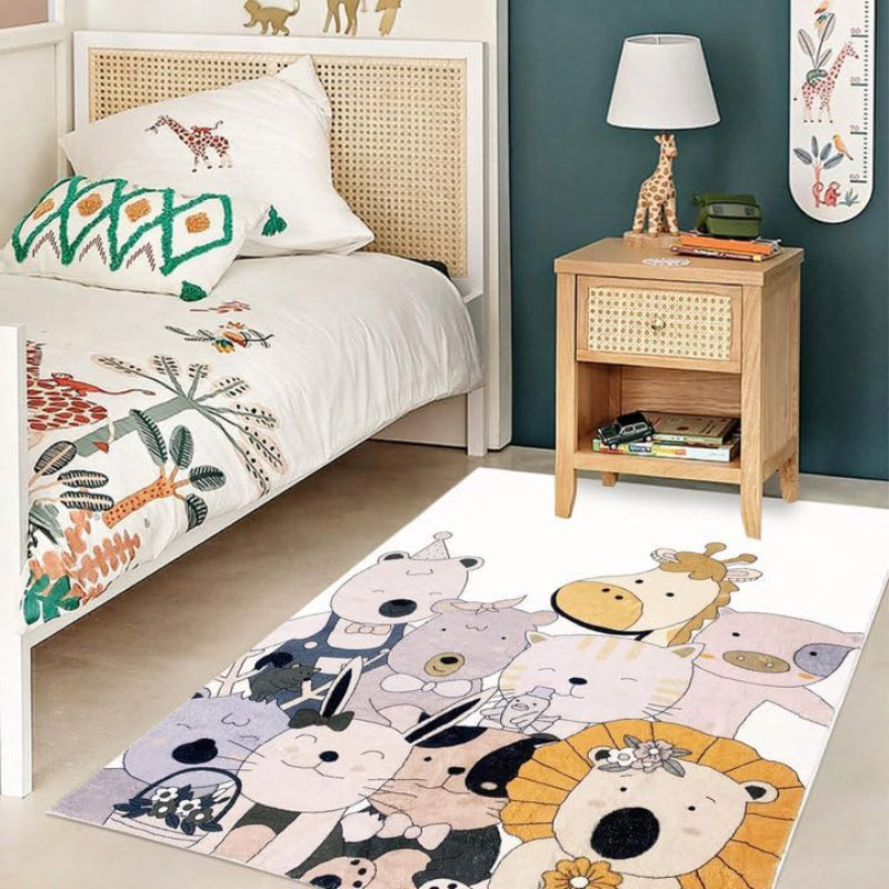 A colorful children's rug featuring a group of cute cartoon animals, including a bear, lion, giraffe, cat, pig, bunny, and others, all smiling and dressed in playful accessories like bows and hats.