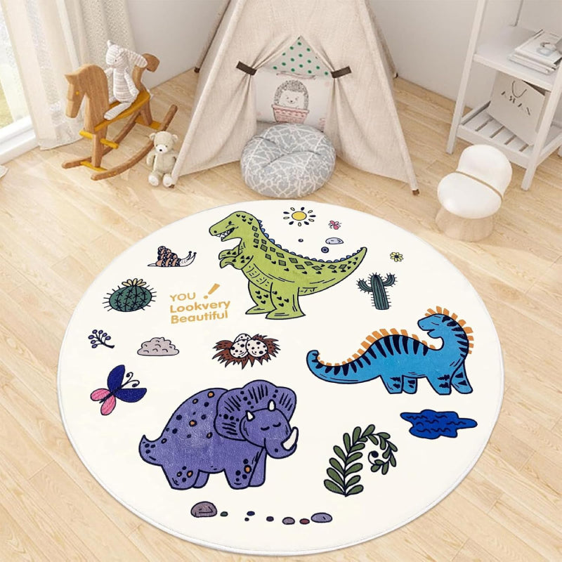 Round children's rug measuring 47.2 inches in diameter, featuring colorful cartoon dinosaurs, plants, butterflies, and eggs on a white background, with the text "YOU! Lookvery Beautiful" printed near the center.