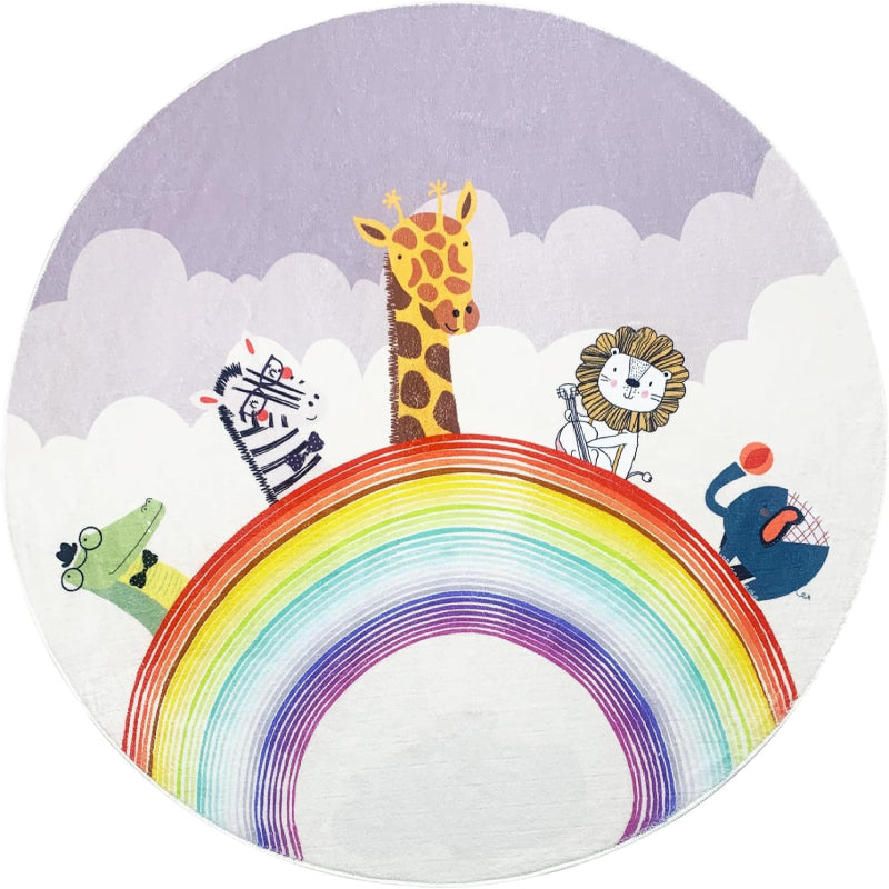 Round kids rug with colorful rainbow and cartoon animals including giraffe, lion, zebra, crocodile, and elephant on a pastel cloud background.