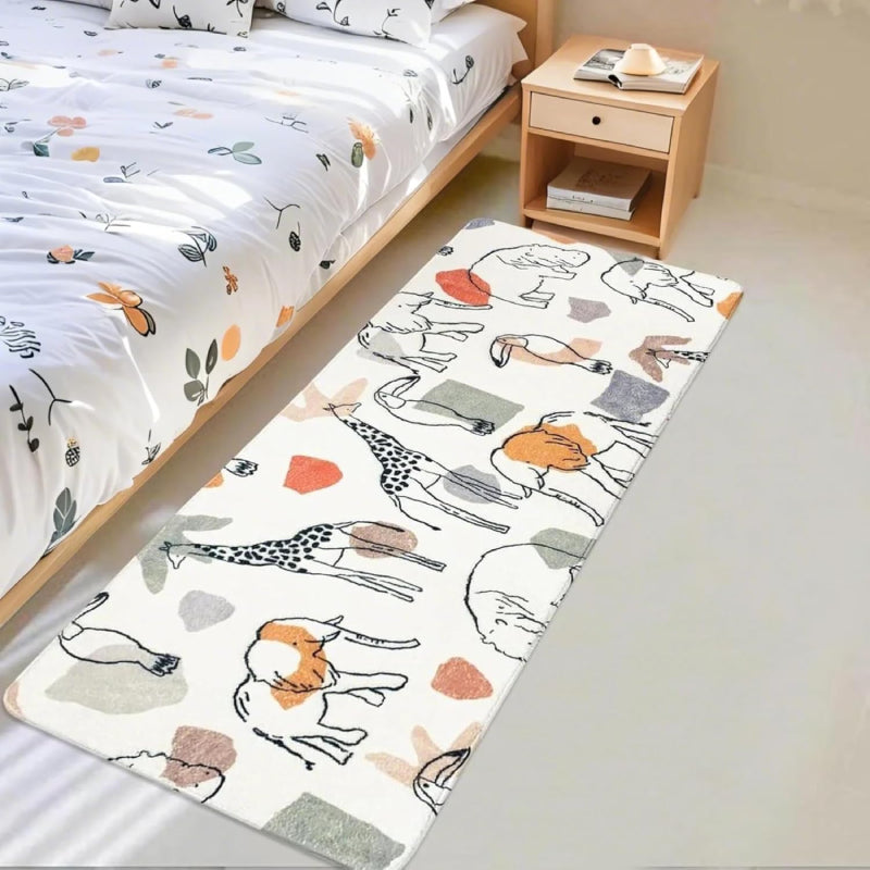Children's bedroom with a soft rectangular rug featuring hand-drawn animals like giraffes, lions, elephants, and camels in neutral and pastel colors.
