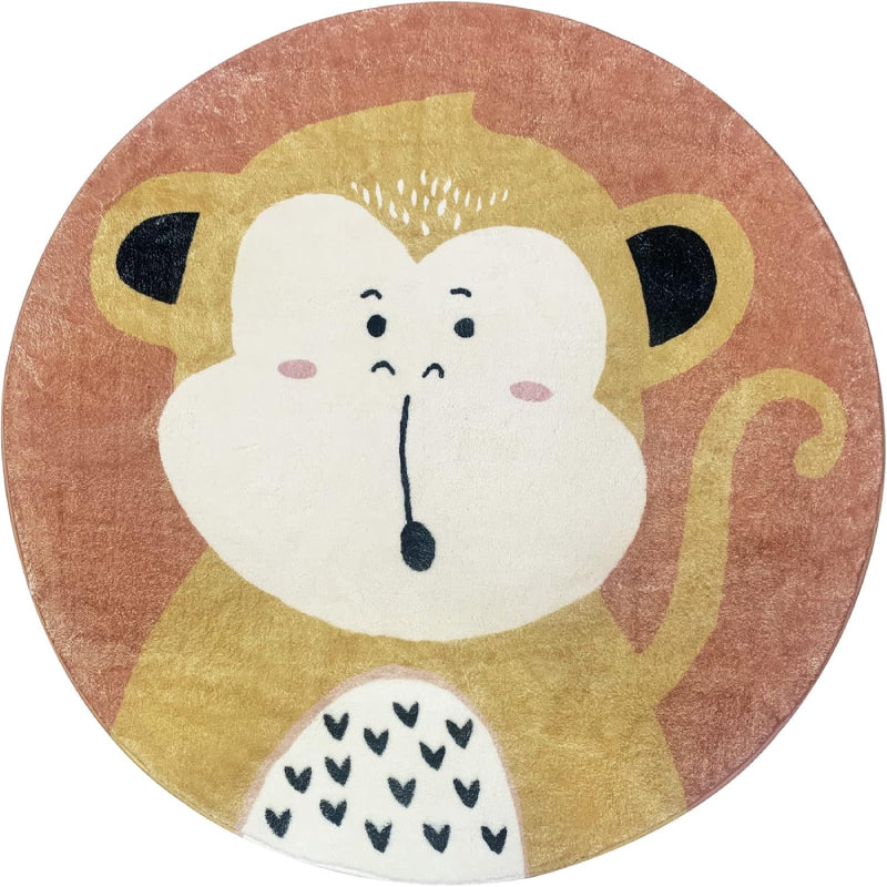 Round children's rug featuring a cute cartoon monkey with a surprised expression, set against a warm brown background.