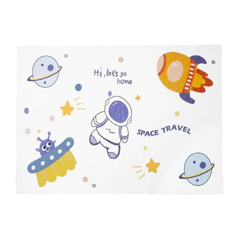 Kids rug with outer space theme featuring cartoon astronaut, rocket, UFO, planets, stars, and the phrases 'Hi, let's go home' and 'SPACE TRAVEL'.