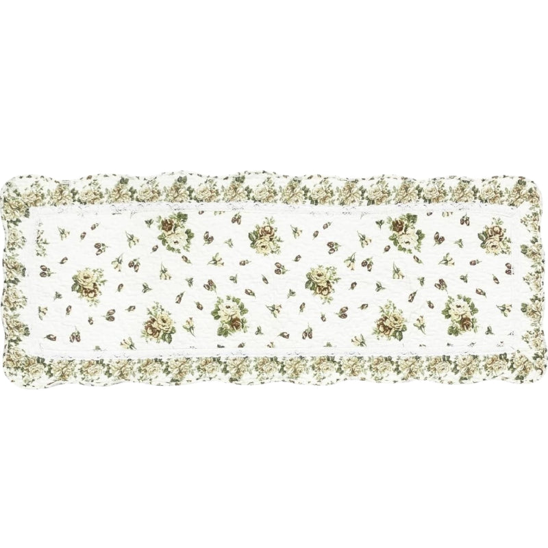 Rectangular living room rug with a white background, featuring a vintage yellow rose floral pattern and a scalloped floral border