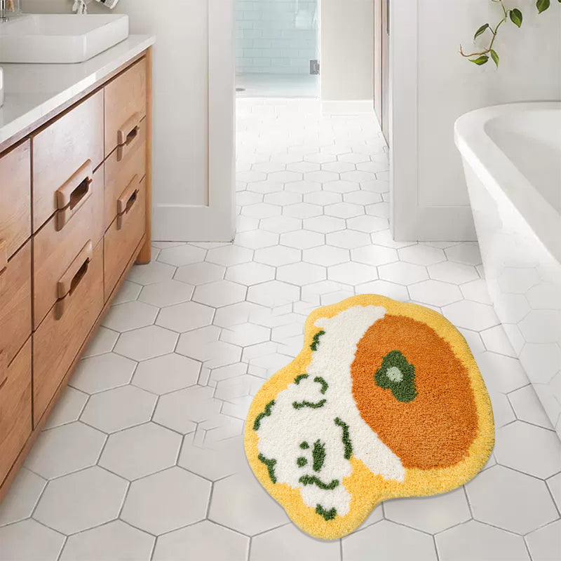 Bathroom rug with an orange puppy design, shaped playfully and perfect for adding a cute touch to bathroom decor.