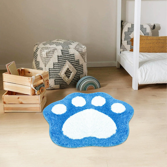 Blue and white paw print bathroom rug made of soft, absorbent microfiber with a non-slip backing.