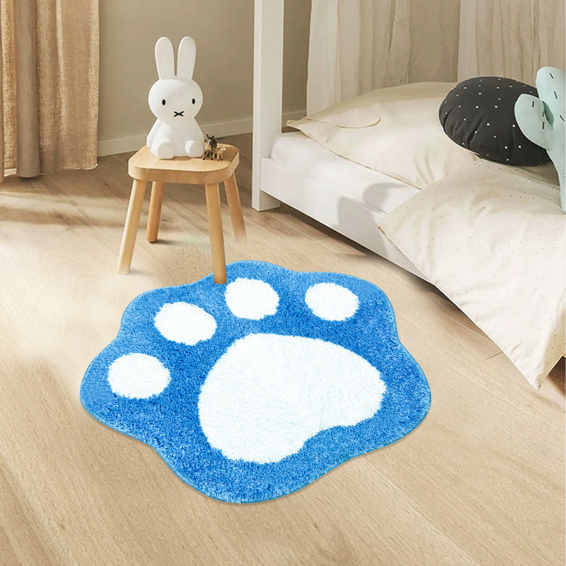 Blue and white paw print bathroom rug made of soft, absorbent microfiber with a non-slip backing.