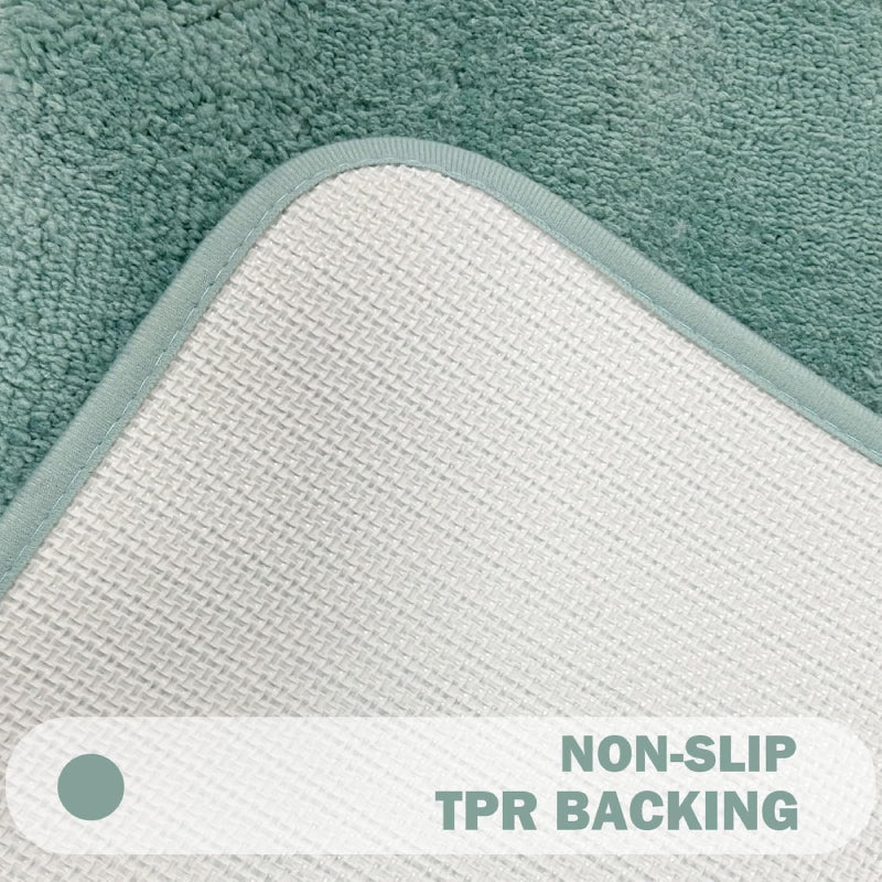 Turquoise shaggy bathroom rug with soft microfiber texture and simple rectangular border design, perfect for a cozy, spa-like feel.