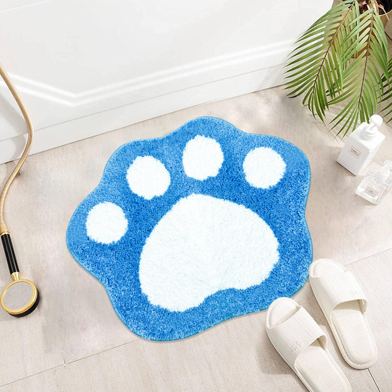 Blue and white paw print bathroom rug made of soft, absorbent microfiber with a non-slip backing.