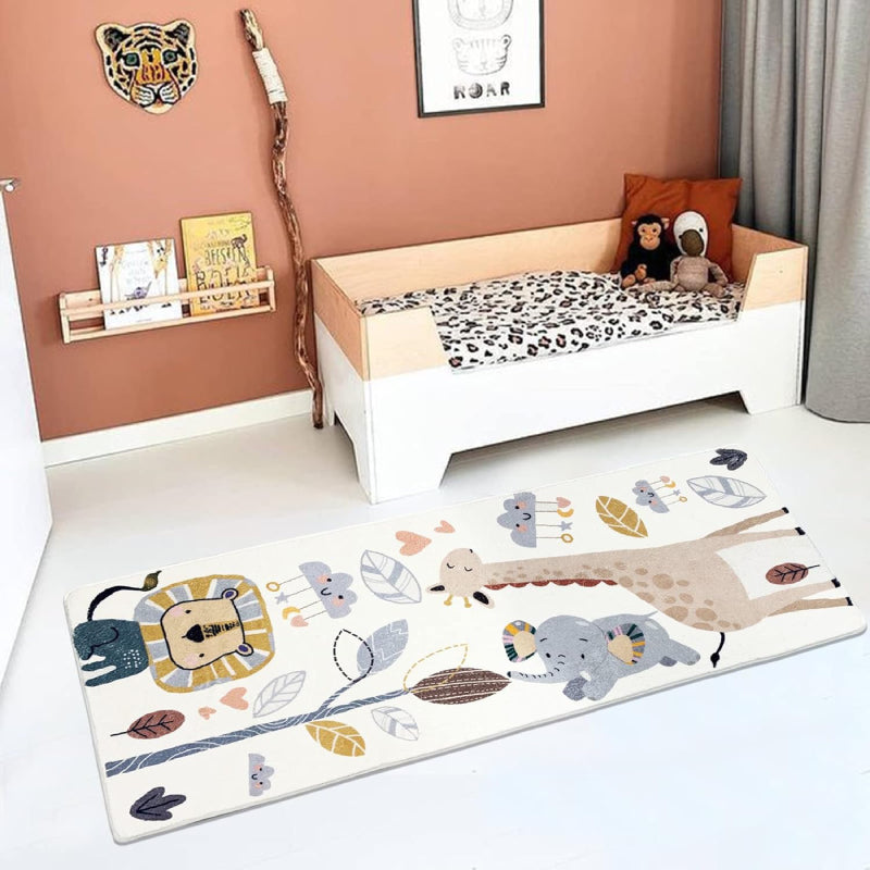 Colorful children's rug featuring cute cartoon animals including a giraffe, elephant, lion, and smiling clouds, surrounded by whimsical leaves and hearts on a white background.