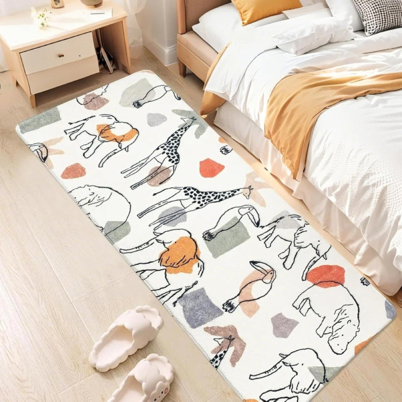 Children's bedroom with a soft rectangular rug featuring hand-drawn animals like giraffes, lions, elephants, and camels in neutral and pastel colors.