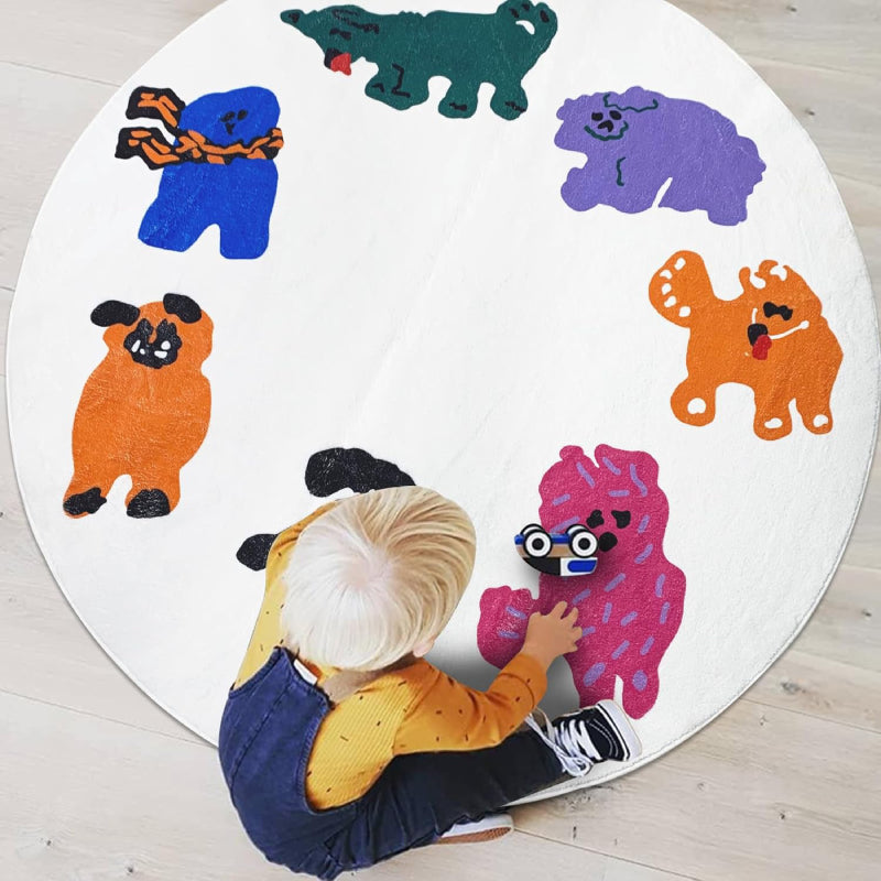 Round kids rug featuring colorful cartoon animals arranged in a circle on a white background, including playful characters in orange, black, green, purple, pink, and blue.