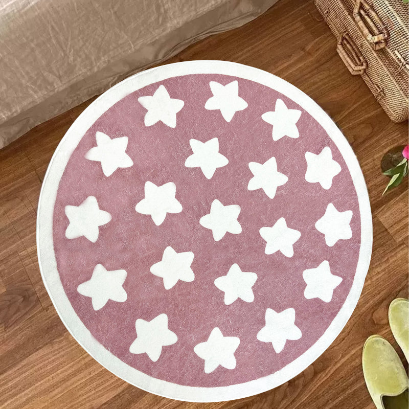 Round kids rug with a playful star pattern, featuring multiple white stars evenly spaced across the surface and bordered by a simple circular edge.